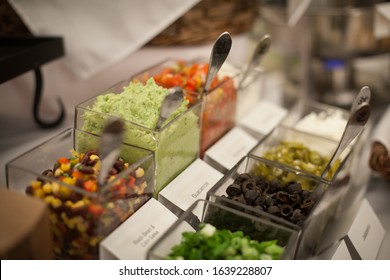 Guacamole And Salsa Set Up In A Taco Bar Buffet Line