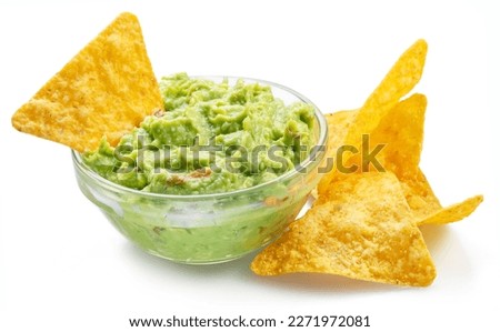 Guacamole sauce and tortilla chips, popular Mexican food  isolated on white background.  Stockfoto © 