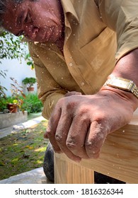 Guadalajara, México; 09/16/2020; Hispanic Male Adult Carpenter Working On A Piece Of Furniture Made Of Pine Wood