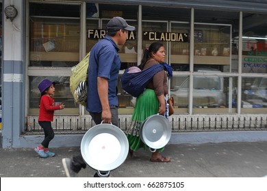 GUADALAJARA, JALISCO MEXICO, MAY 15 , 2017.
Indigenous Mexican  Family Working At The Atemajc Market In Guadalajara Mexico, Selling Cooking Pots 