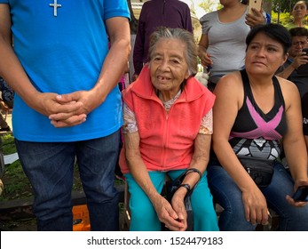 Guadalajara, Mexico - October 6 2019: Elderly Lady And Waiting For 