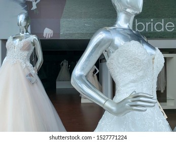 Guadalajara, Mexico - October 6 2019: Bridal Boutique Store Window. Two Mannequins Wedding Dresses On A Window Display. Plus Size Wedding Dress