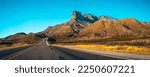 Guadalupe Mountains National Park landscape near El Captain Viewpoint on Route 62 in Salt Flat, Dell City, Texas, USA, panoramic retro-style autumn road scenery with golden grasses
