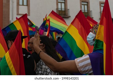 León, Guanajuato, Mexico - June 26, 2021: Young Men Taking A Selfie During The Pride Parade. Selfie