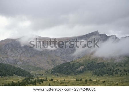 Guanella pass, mountain pass in Colorado. Fog and clouds over mount Bierstadt on rainy fall day. Mount Bierstadt trailhead