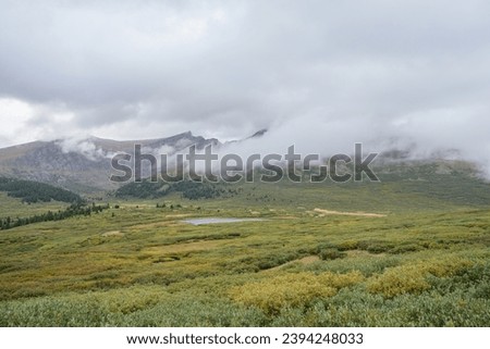 Guanella pass, mountain pass in Colorado. Fog and clouds over mount Bierstadt on rainy fall day. Mount Bierstadt trailhead, Bierstadt lake