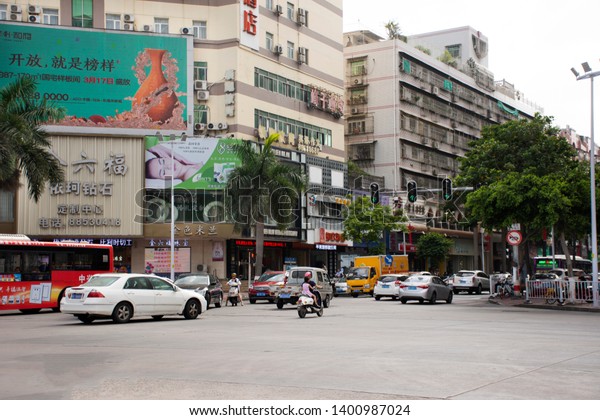 GUANGDONG, CHINA - MAY 8 : View\
at beside road of landscape and cityscape of Shantou from taxi car\
on the road at old town Swatow city on May 7, 2018 in Guangdong,\
China