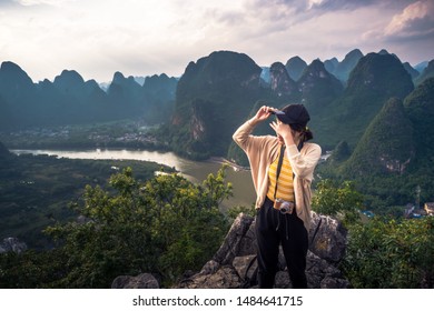 GUANGXI,GUILIN 14 may 2019 - the girl watching view of the Li River seen from Laozhai Mountain (Laozhai Shan),located at Xingping ancient town,Yangshuo town