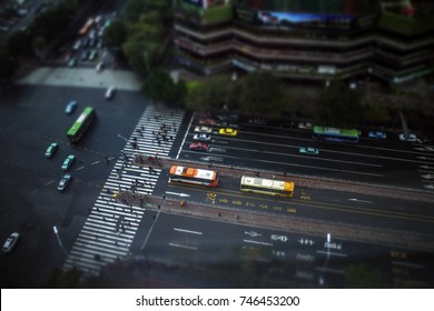 Guangzhou, China. 10 MAR 2014: Top View Of Street In Guangzhou, China. Miniature Tilt Shift Lens Effect.