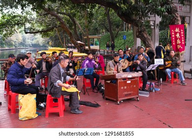 Guangzhou, China - 28th December 2018 : One Full Traditional Chinese Orchestra Performing In Front Of Yue Xiu Park Near Beixiu Lake.