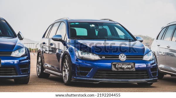 Guangzhou, China- August 16,2022: A blue\
Volkswagen R36 sedan is parked in\
courtyard