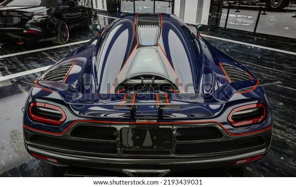 Guangzhou, China- August 16,2022: a\
blue Koenigsegg AGERA R BLT hypercar is parked in\
showroom