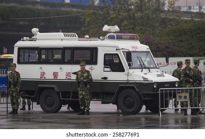 GUANGZHOU, CHINA - MARCH 6. 2015:Armed Paramilitary Policemen Stand Guard In Front Of The Guangzhou Railway Station After A Knife Attack, In Guangzhou, Guangdong Province.