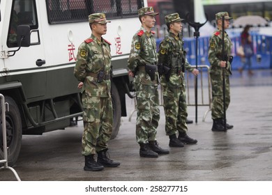 GUANGZHOU, CHINA - MARCH 6. 2015:Armed Paramilitary Policemen Stand Guard In Front Of The Guangzhou Railway Station After A Knife Attack, In Guangzhou, Guangdong Province.