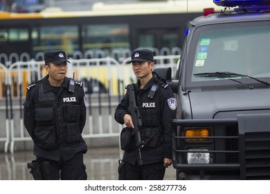 GUANGZHOU, CHINA - MARCH 6. 2015:Armed Paramilitary Policemen Stand Guard In Front Of The Guangzhou Railway Station After A Knife Attack, In Guangzhou, Guangdong Province.