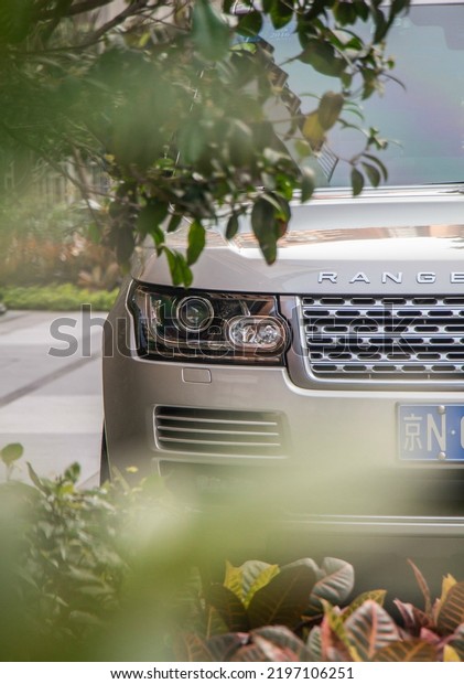 Guangzhou, China- September 1,2022: A silver Range\
Rover SUV is parked in\
street