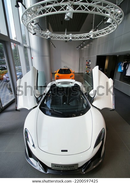 Guangzhou, China- September 1,2022: a white\
McLaren hypercar is parked in \
showroom