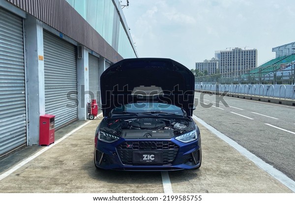 Guangzhou, China- September 8,2022: A blue Audi\
S4 sedan is parked in\
courtyard