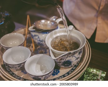 Guangzhou, Guangdong, China - 2 May 2019: A Server Pouring Tea.