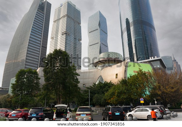 Guangzhou, year 2019: modern buildings in\
downtown. Futurist skyscrapers. City of\
China.