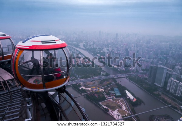GUANGZHOU,CHINA, December 30, 2018,  Guangzhou\
cityscape view from cable car (tram) on top outdoor observation\
deck of Canton Tower at Guangzhou\
,China
