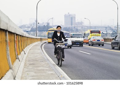 GUANGZHOU-FEB. 21, 2012. Air Pollution On Feb. 21, 2012 In Guangzhou. China Has Surpassed The United States As The World's Largest Emitter Of Carbon Dioxide, Putting Out 6,200 Million Tons Annually