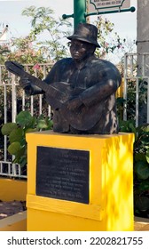 Guanica, Puerto Rico - March 22, 2022: Statue Of Musician And Cuatro Player Yomo Toro.