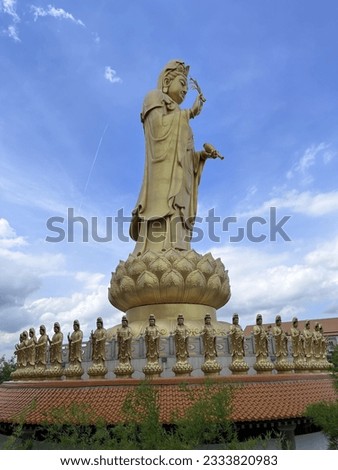 Guanyin Chinese Goddess Statue Sky Background in Fo Guang San temple in Bangkok Thailand