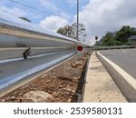 Guard Rail or Road Safety Fence is a system used to protect people or vehicles made of iron rails as fences on dangerous roads such as mountains, rivers, ravines, etc.