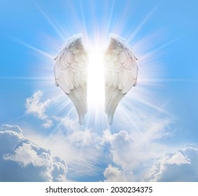 Guardian Angel Blue Sky - Beautiful Angelic Wings With Bright White Light Between Floating In A Pink Blue Ethereal Sky Background With Copy Space
