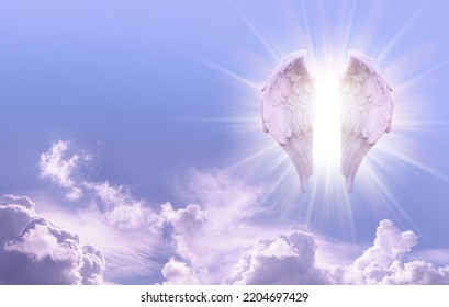 Guardian Angel Sky Message Banner - Beautiful sunny blue sky with a pair of glowing Angel Wings on one side and copy space for angelic messages
					