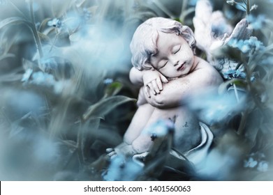 Guardian angel sleeping in flowers 