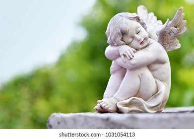 Guardian Angel Sleeping On Grave Stock Photo (Edit Now) 1031054113