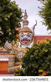 Guardian of Wat Arun. This intricate guardian statue stands proudly at the entrance of Wat Arun, a renowned Buddhist temple located in the Bangkok Yai district of Thailand's capital