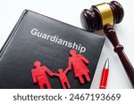 Guardianship law, family figures and a hammer.