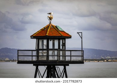 Guardtower of the federal prison on Alcatraz Island in the middle of the bay of San Francisco, California, USA. Jail Concept.