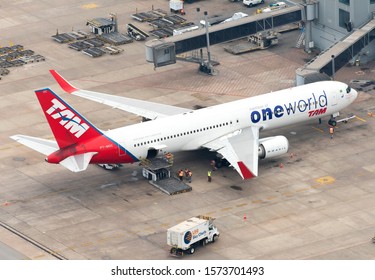 Guarulhos / Brazil - September 21 2019: Aerial View LATAM Boeing 767 Wearing TAM Colors , From Before The Merge With LAN Airlines. Aircraft With One World Alliance Livery.