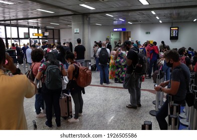 Guarulhos, São Paulo, Brazil - January 11 2021: Crowd Of People Waiting At A Gate Of São Paulo Guarulhos International Airport During The New Coronavirus Covid-19 Pandemic.