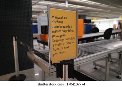 Guarulhos, São Paulo / Brazil - March 27 2020: Orientation Notice To Keep Distance In São Paulo Guarulhos International Airport Due To The New Coronavirus Covid-19 Pandemic.