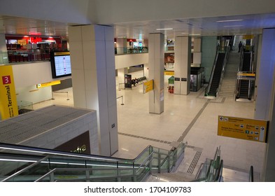 Guarulhos, São Paulo / Brazil - March 27 2020: Few People In Empty Terminal 3 Of São Paulo Guarulhos International Airport Due To The New Coronavirus Covid-19 Pandemic.