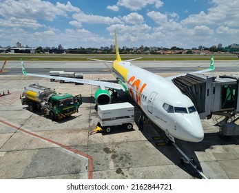 Guarulhos, São Paulo, Brazil - November 17, 2021: Airplane In The Passenger Terminal Of Sao Paulo International Airport