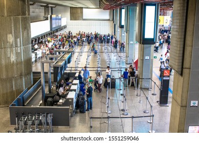 Guarulhos, SP, Brazil, December 27, 2016. Passengers At The Check-in Area In The Lobby Of André Franco Montoro International Airport, Cumbica Airport, In Guarulhos City.