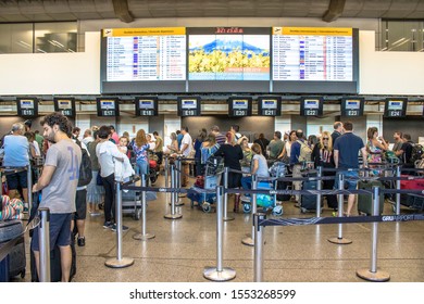 Guarulhos, SP, Brazil, December 27, 2016. Passengers At The Check-in Area In The Lobby Of André Franco Montoro International Airport, Cumbica Airport, In Guarulhos City.