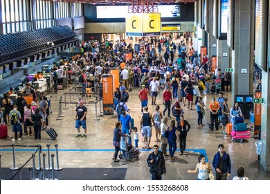 Guarulhos, SP, Brazil, December 27, 2016. Passengers At The Check-in Area In The Lobby Of André Franco Montoro International Airport, Cumbica Airport, In Guarulhos City.