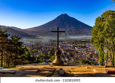 Guatemala. Antigua. Cerro de la Cruz - viewpoint over town, there is Agua volcano opposite the cross (devoted to the city's patron, St. James)