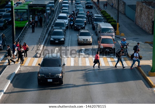 GUATEMALA - CITY, March 09, 2018 - Traffic in\
Guatemala City, working people, pedestrians in Latin America\
Street, civic center.\
EDITORIAL