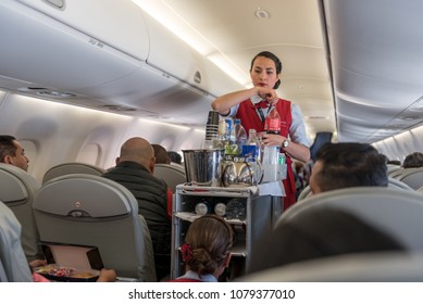 GUATEMALA -NOVEMBER 22, 2017: AeroMexico Airplane, Cabin Crew Working And Provinding Food.