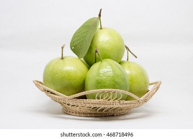 Guava (tropical Fruit) In Wicker Basket On The White Background