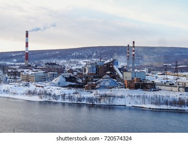GUBAKHA, PERM KRAI, RUSSIA - MARCH 1, 2017:  The view from the top of the mountain at the industrial site of the plant", OAO" gubakhinskiy coke " on a winter day. Russia. Ural
