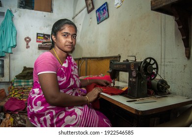 Gudur, Andhra Pradesh, India - 24 December 2014: Indian woman operating a small sewing business from her small home.